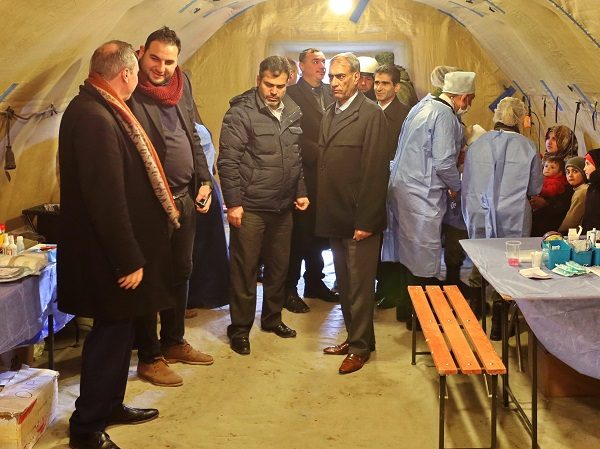 Click to enlarge Belgian MPs visit the temporary refugee shelter in Jibreen, Aleppo