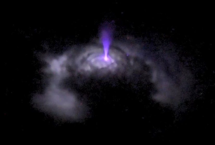 An image captured from the International Space Station shows an electrical discharge known as a blue jet shooting up toward space from a cloud.