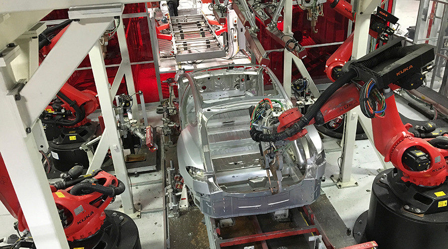Click to enlarge Tesla workers