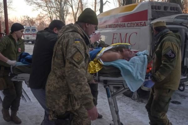 Click to enlarge injured soldier