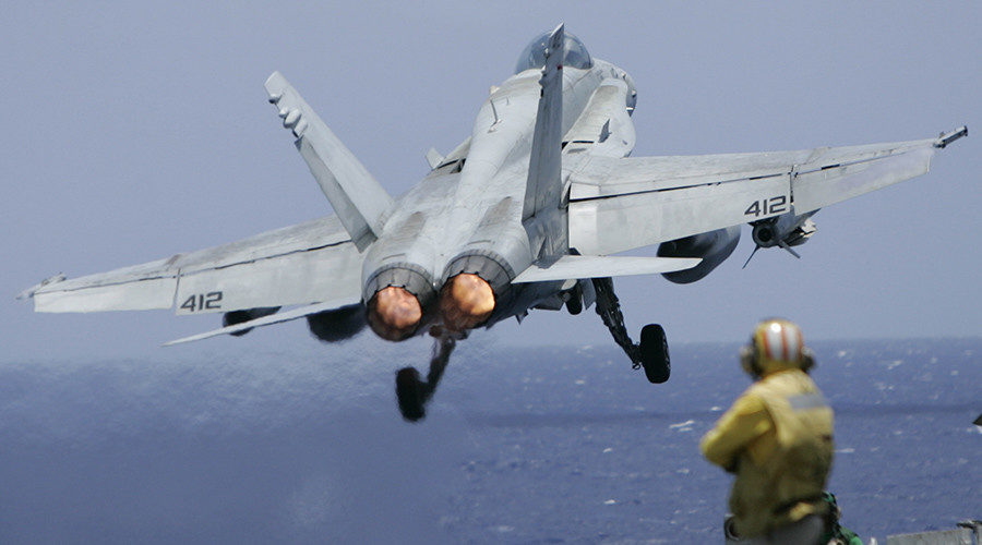 us navy f/a 18 hornet taking off