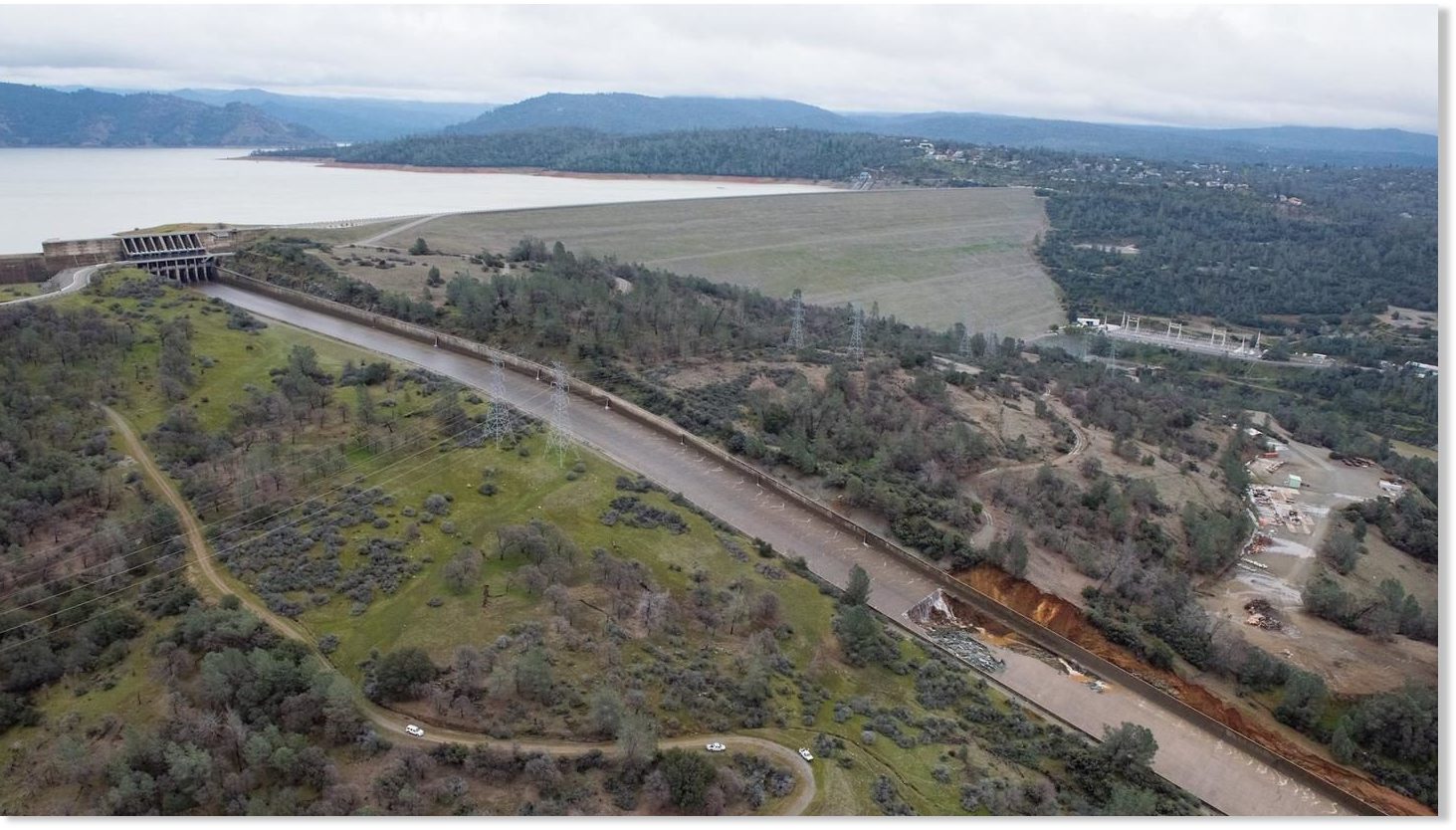 California's Oroville Dam too full, spillway fails from sinkhole damage
