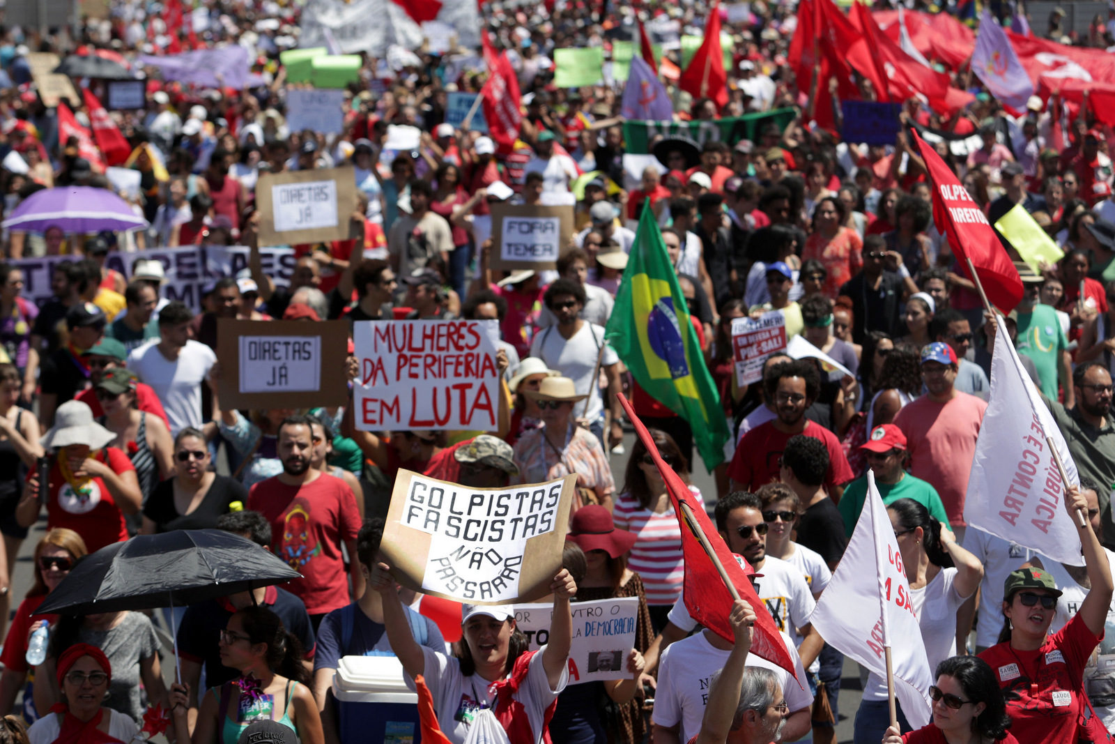 Click to enlarge Demonstrators protest Brazil’s President Michel Temer
