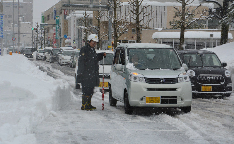 A traffic jam is seen in front of JR Tottori Station in Tottori, on Feb. 13, 2017. 