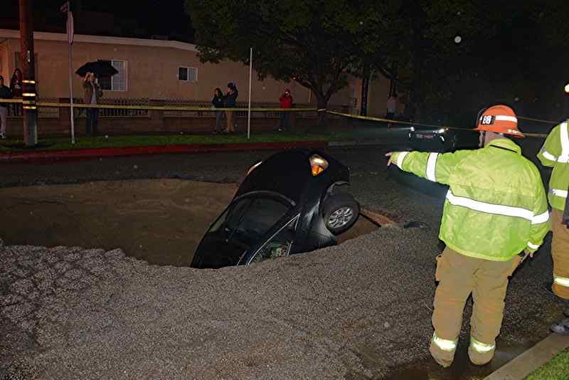 One Rescued After Sinkhole Swallows 2 Cars In Studio City