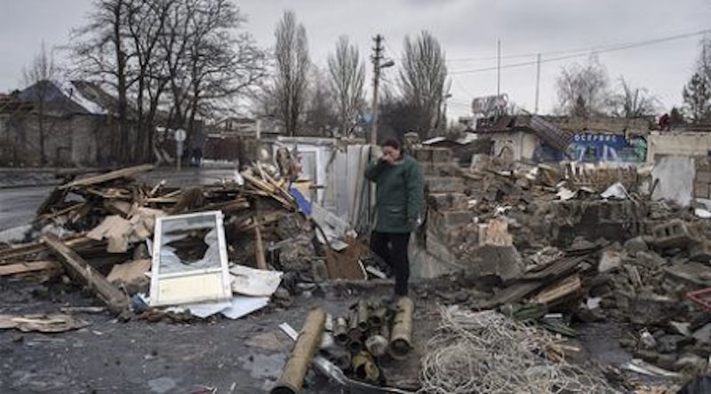  A woman on the site of a destroyed building