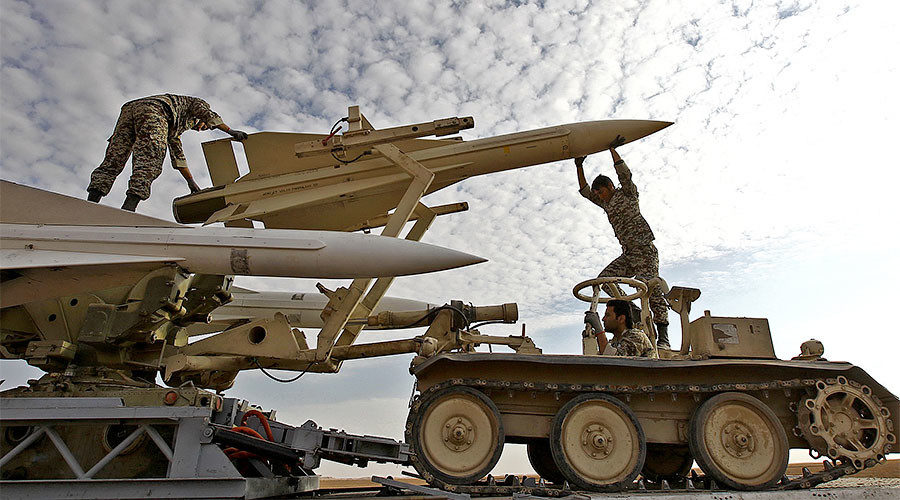 Click to enlarge Iranian army personnel prepare to launch a Hawk surface-to-air missile.