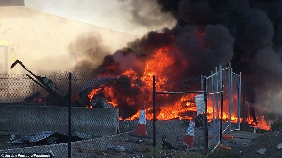 Firefighters have been battling the blaze next to Essendon Airport in Melbourne's north