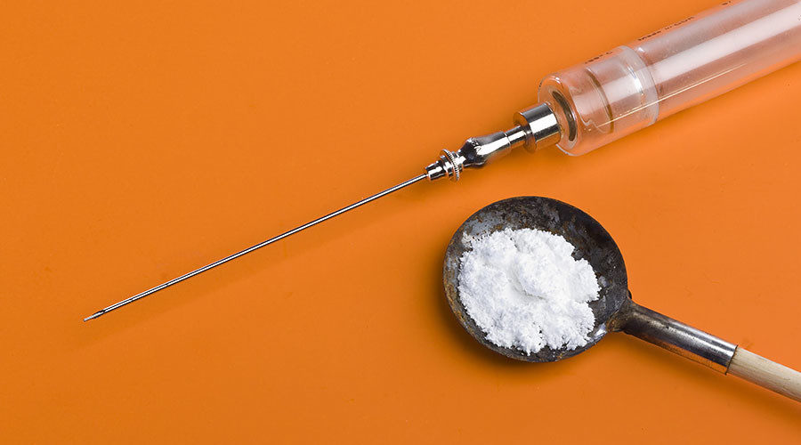 Click to enlarge Heroin needle