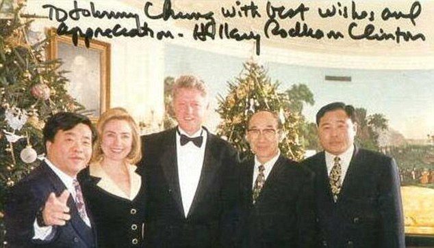 Click to enlarge Johnny Chung with the Clintons