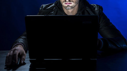 person on computer laptop