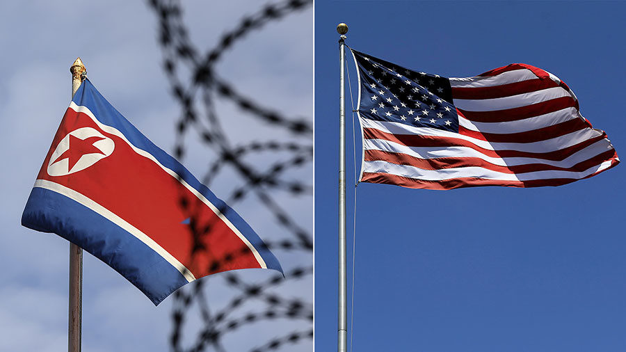 North Korea (L) and U.S. flags 