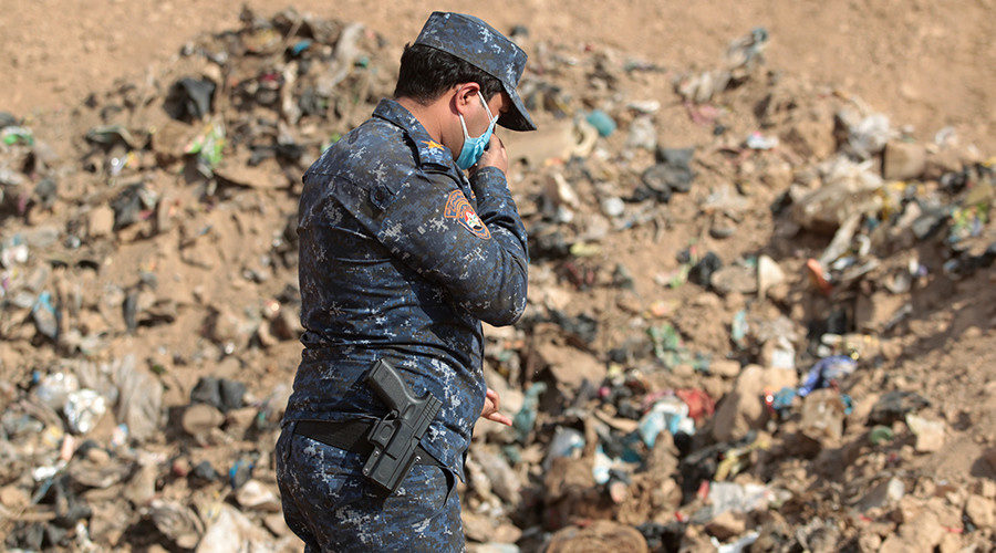Click to enlarge mass grave Iraq