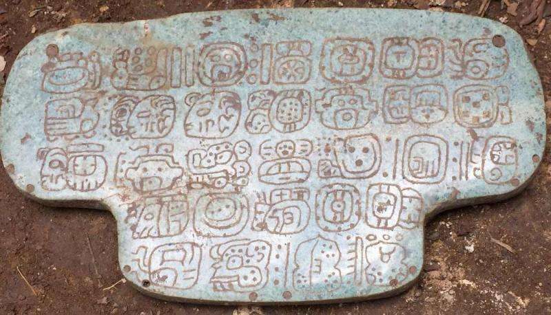 Mayan hieroglyphs on jade