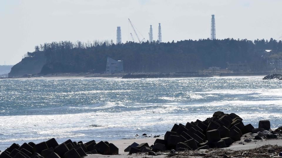 A picture taken on February 10, 2016 shows cranes at the Fukushima Daiichi nuclear power plant in Namie, Fukushima prefecture, in Japan.