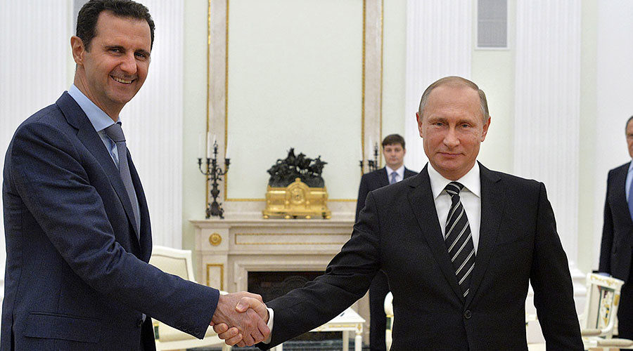 Click to enlarge putin assad handshake