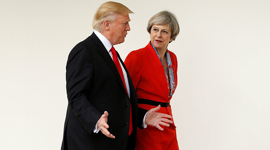 U.S. President Donald Trump escorts British Prime Minister Theresa May