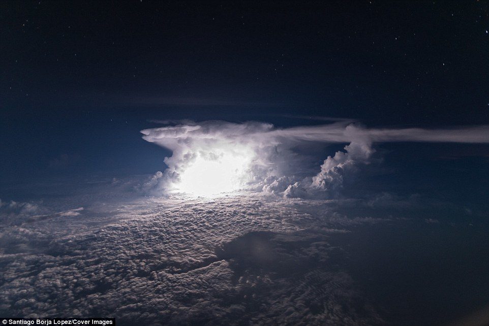 After taking this jaw-dropping snap from the cockpit of his passenger jet over Colombia Amazonia, he commented:'I've never seen lightning like this one. What sets the path of lightning?'