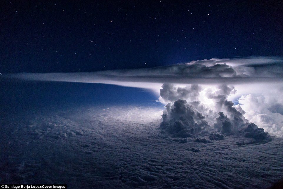 Click to enlarge Although this storm looks formidable, Mr Borja said he never felt frightened while travelling past it. This picture won third place in the 2016 National Geographic Nature Photographer of the Year Award