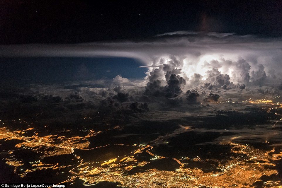An ominous storm over Panama City: Cumulonimbus clouds are created through convection, often growing from small cumulus clouds over a hot surface