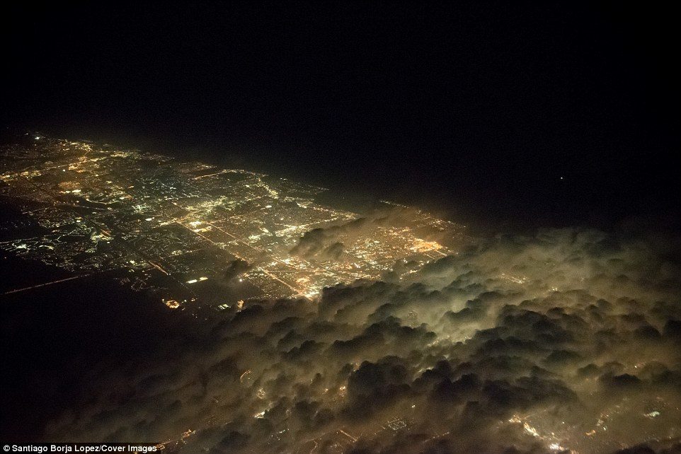 Click to enlarge Mr Borja said this shot was taken on 'one of those clear days over Miami'.