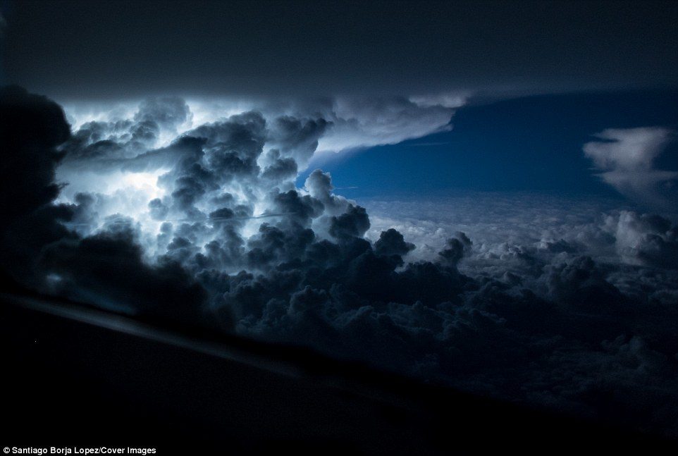 Cumulonimbus clouds are created through convection, often growing from small cumulus clouds over a hot surface. 