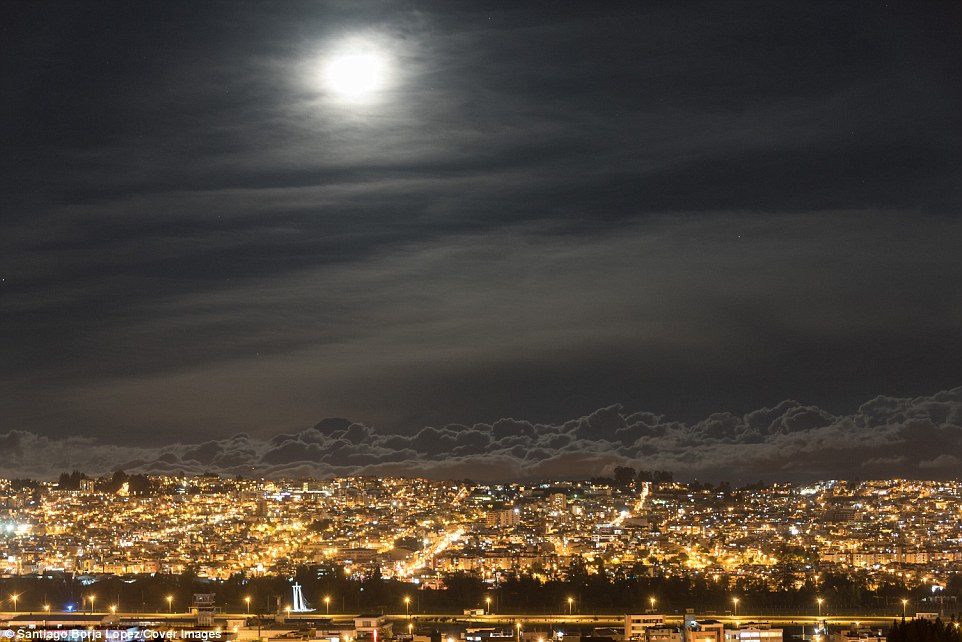 Click to enlarge Mr Borja said of this image: 'Mooning Around - At 2900m in Quito, Ecuador, this is what I call a supermoon'