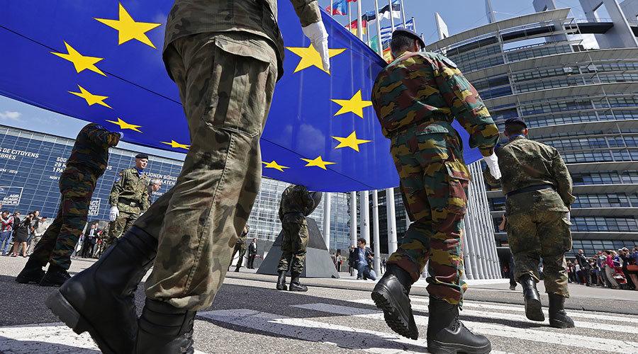 Soldiers of the Eurocorps hold the European flag
