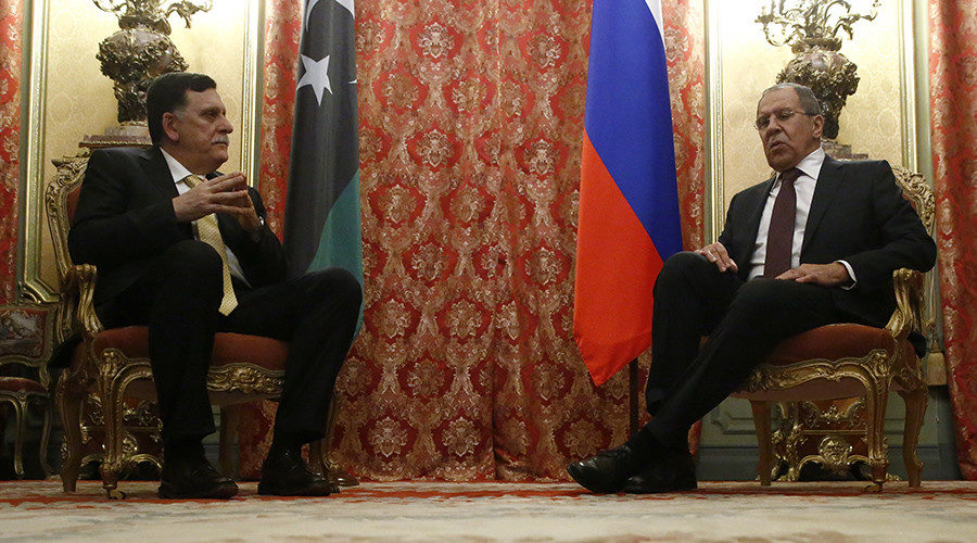 Sergei Lavrov (R) meets with Fayez Seraj