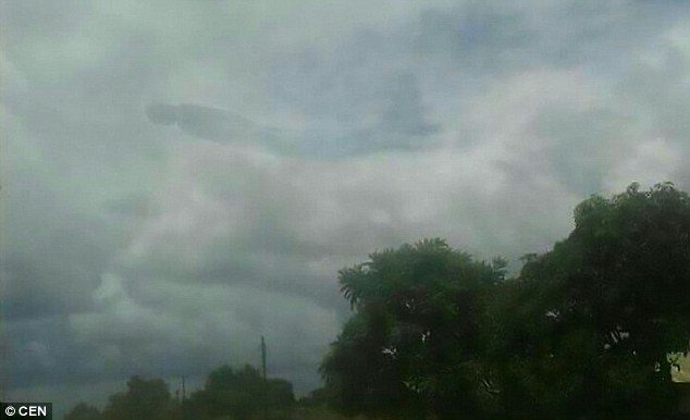 Photographs show a large humanoid head and torso, tailing into the sky and it is thought to have measured more than 100 metres long