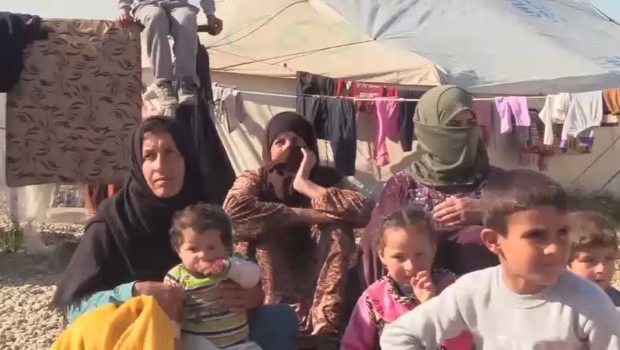 Click to enlarge refugee in Mosul