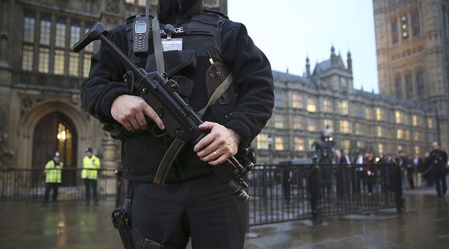 Policeman with machine gun