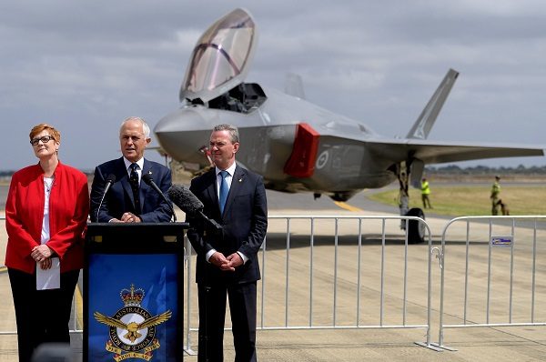 Australian Prime Minister Malcolm Turnbull speaks next to Minister for DefenceAustralian Prime Minister Malcolm Turnbull speaks next to Minister for Defence