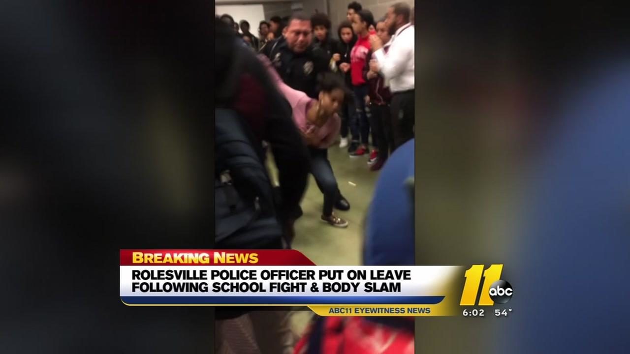 cop slams teen girl on ground