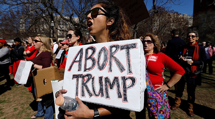 Click to enlarge Day without women protest