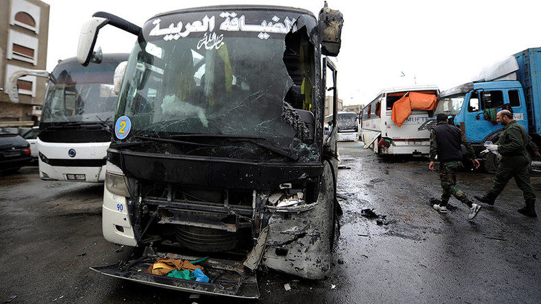 Click to enlarge Damaged buses at the site of an attack by two suicide bombers in Damascus, Syria March 11, 2017