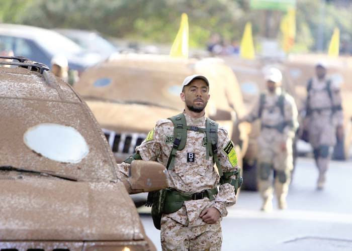 Click to enlarge Circle of fire. Hezbollah members