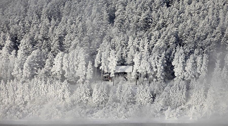 snow covered house taiga forest siberia russia