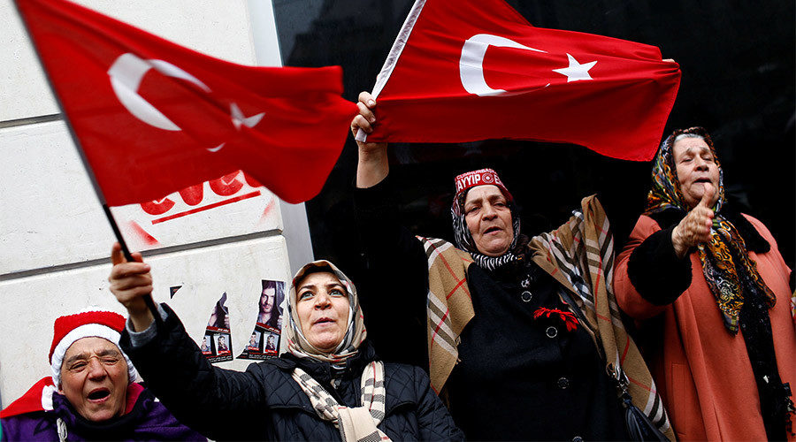 Demonstrators wave Turkish flags