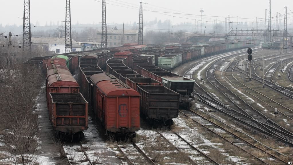 Empty coal wagons parked near a metallurgical plant in separatist-controlled territory in the Donetsk region