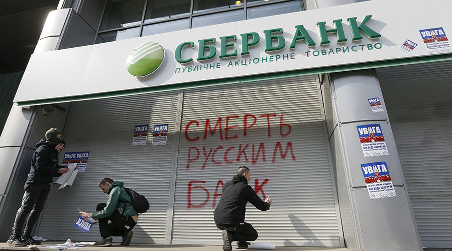 Ukrainian activist spray-painting 