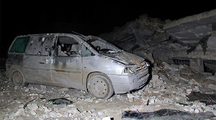 debris following a reported airstrike on a mosque in the village of Al-Jineh in Aleppo province