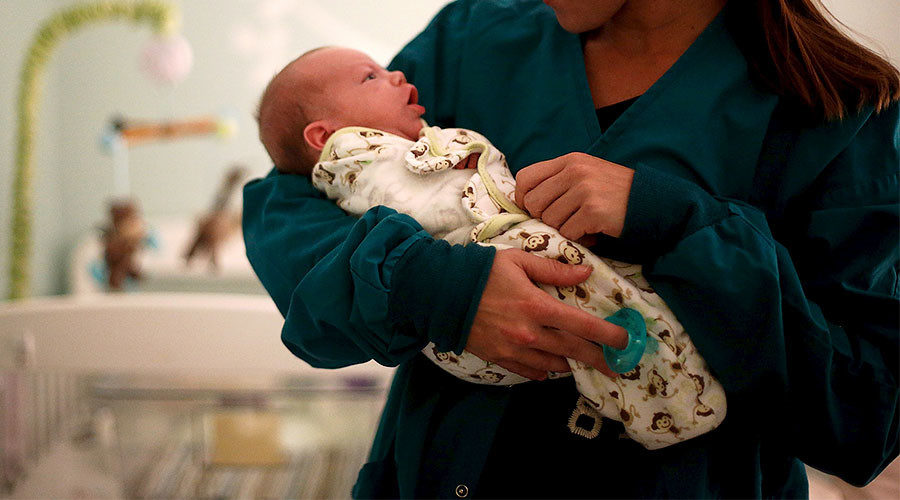 Mother holding baby
