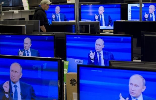 Click to enlarge Putin on computer screens