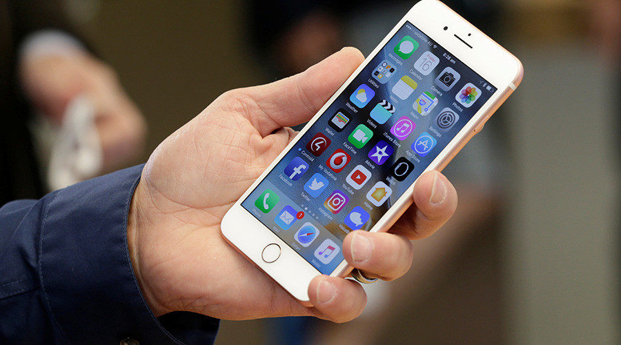 person holding iphone
