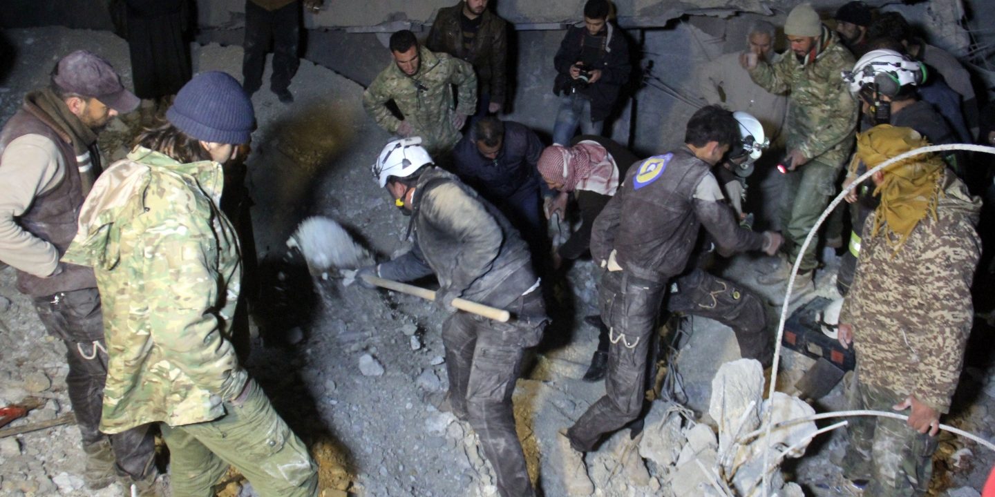 syrians digging out mosque bombing rubble