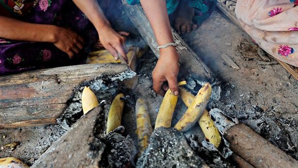Click to enlarge Tsimane people cooking