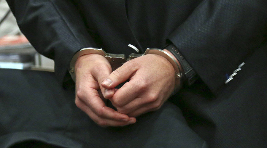 man in handcuffs