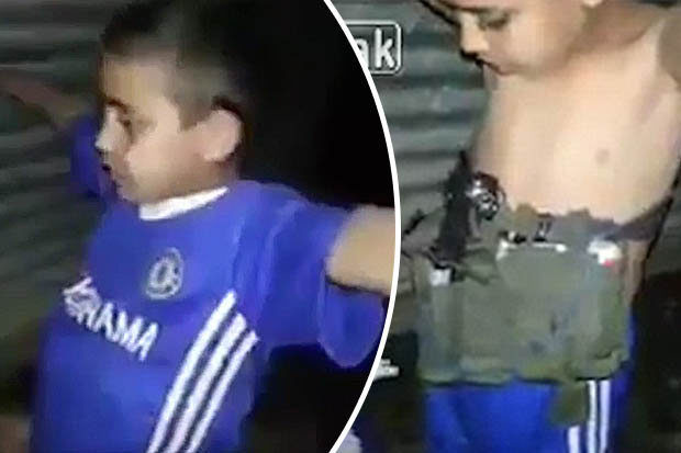 A brave soldier calms the boy before disarming the killer device
