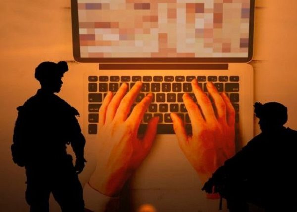 soldiers and laptop